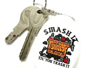 白の楕円コインケース Smash It 鍵付き